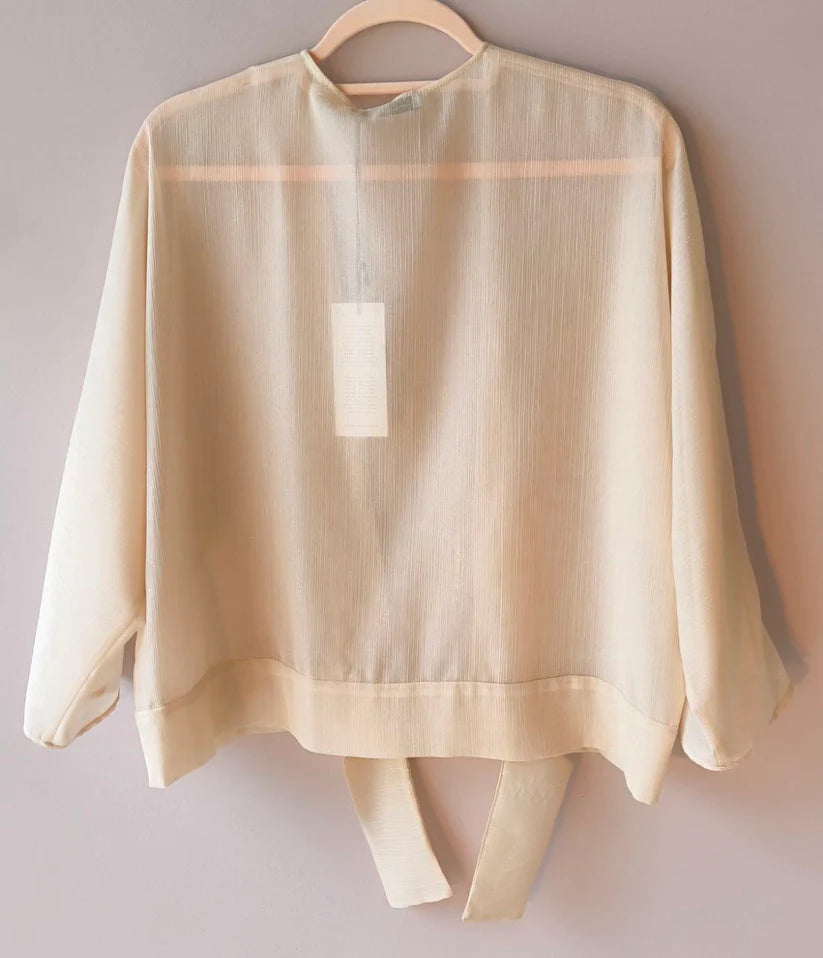 Coprispalle camicia trasparente beige dorato