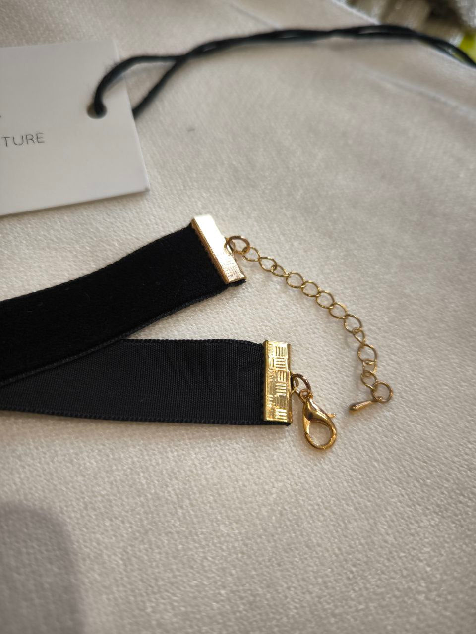 Chocker in velluto nero e oro