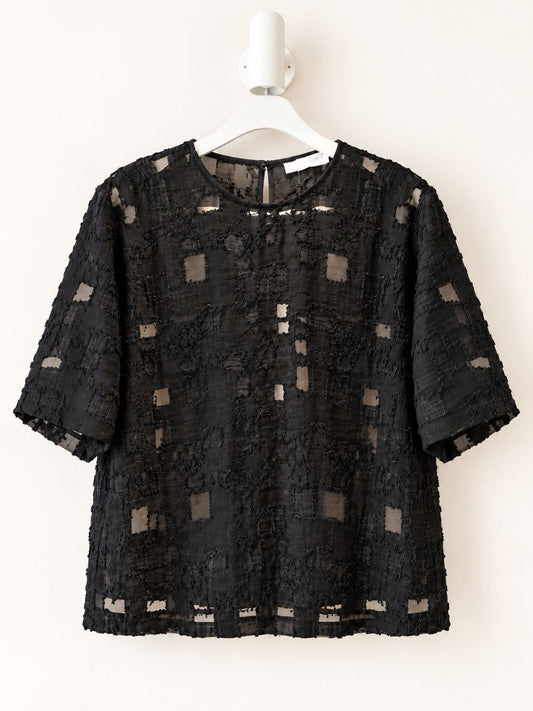 T-shirt elegante nera devorata in seta